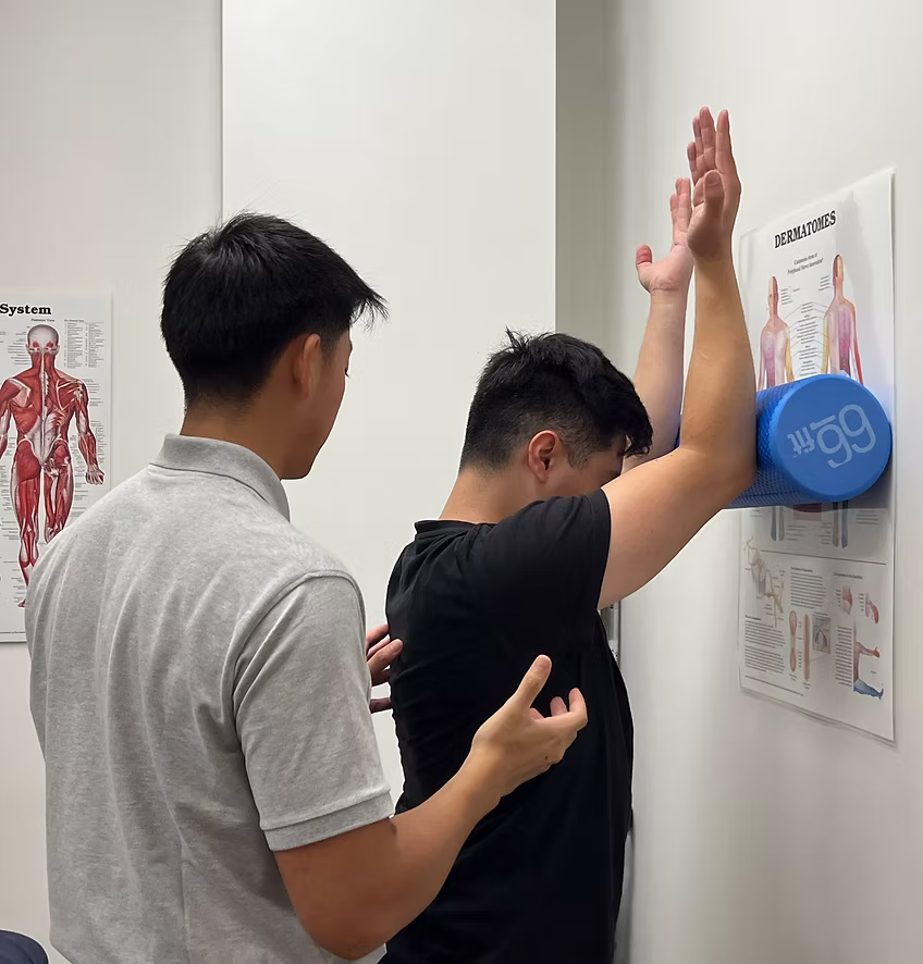 Practitioner guiding a patient through personalised rehab